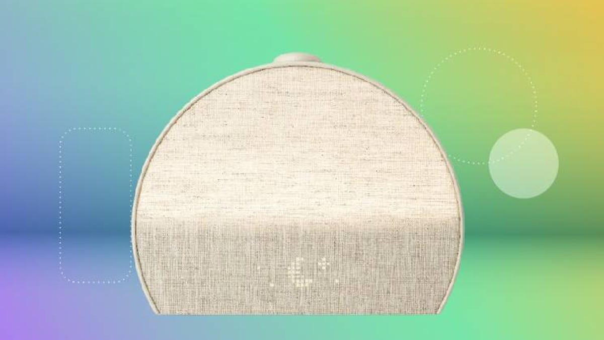 The Hatch Restore Alarm Clock on a colorful background