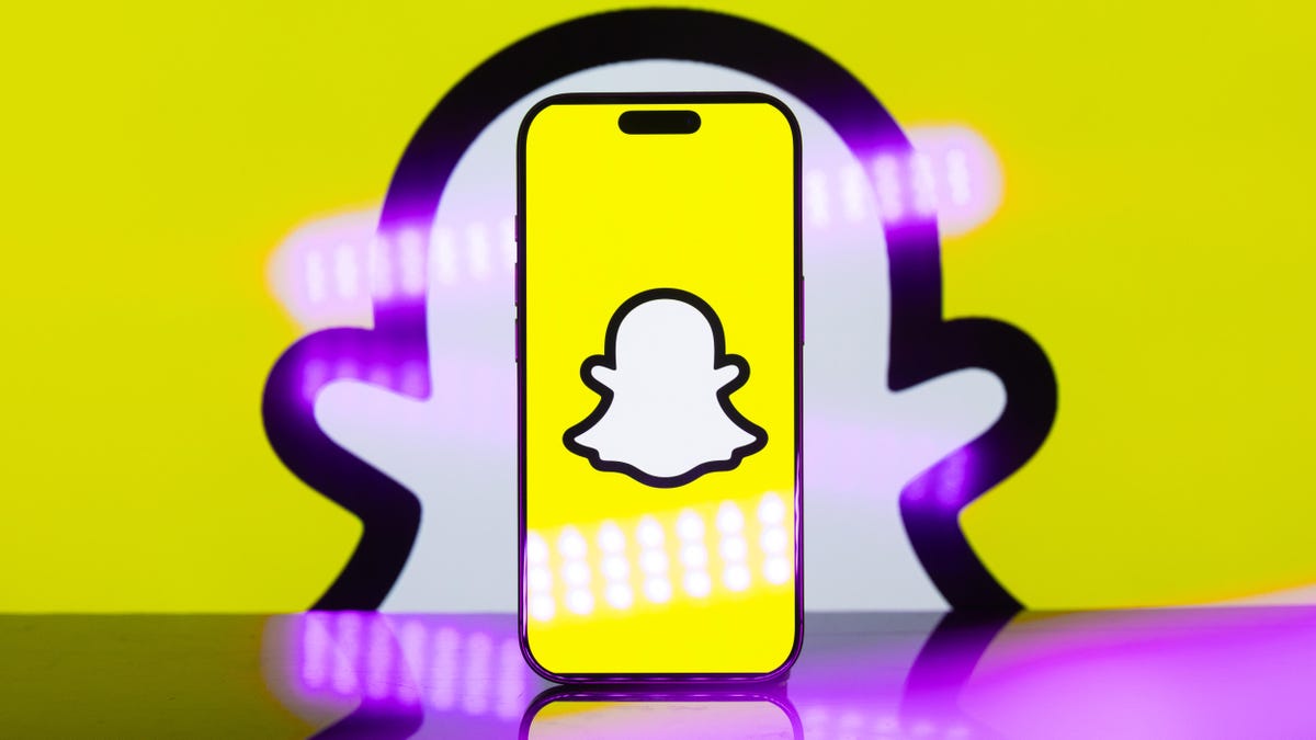 Snapchat ghost logo on a phone