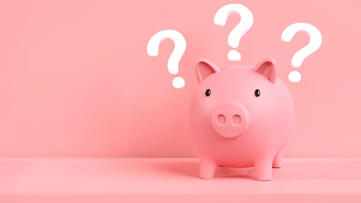 piggy bank with question marks above its cute pink head