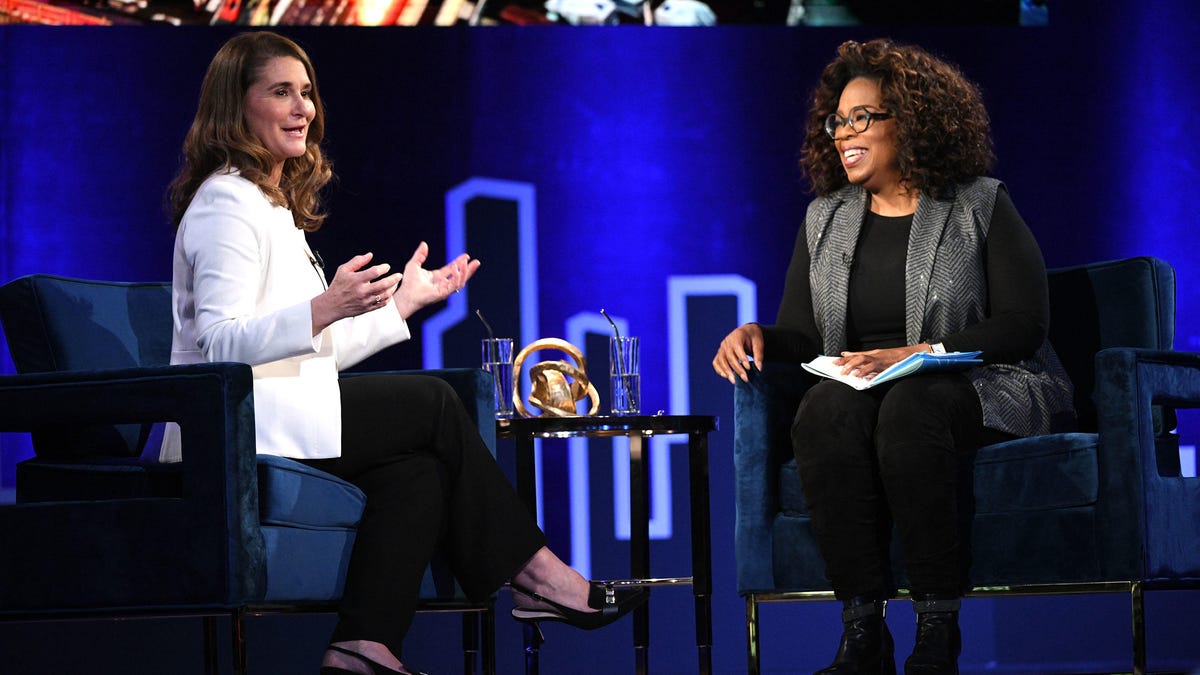 Oprah on stage with Melinda Gates