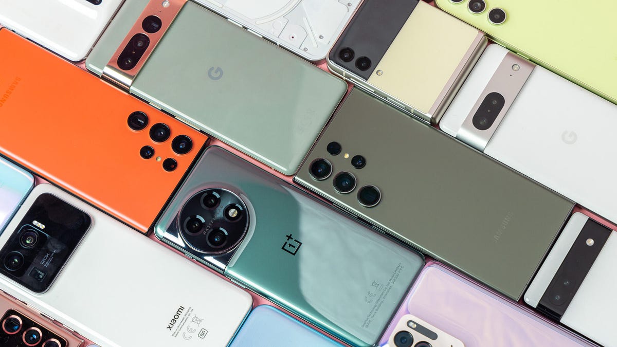 Lots of phones laid out flat.