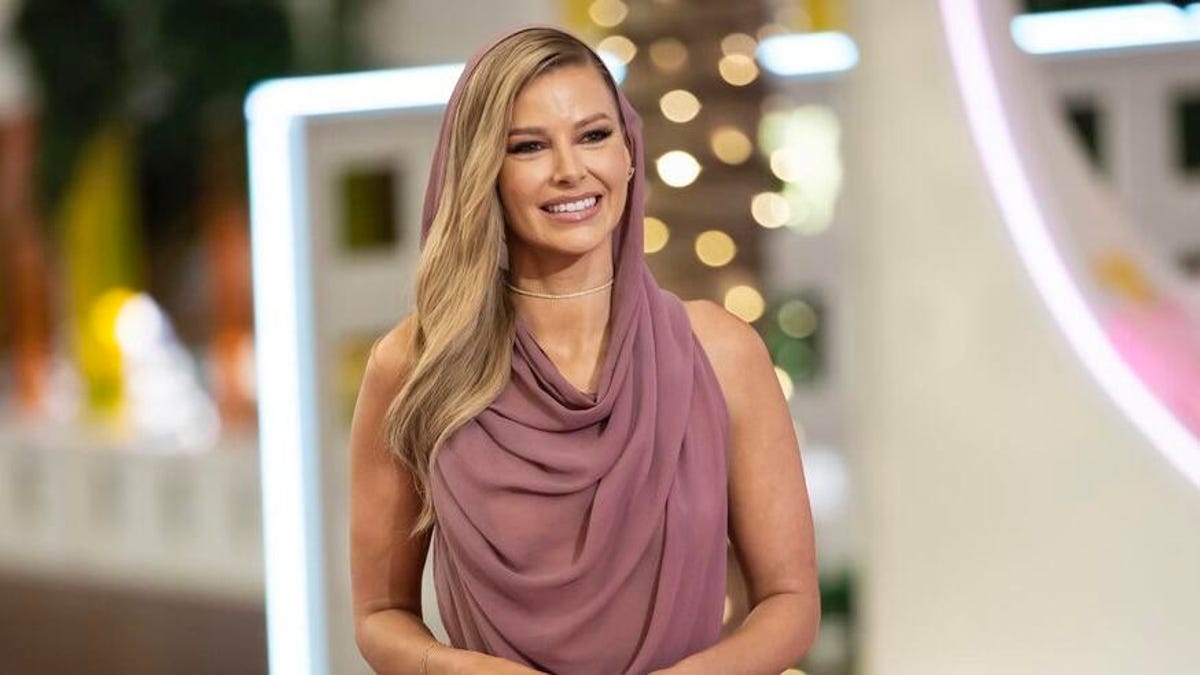 woman wearing a purple dress