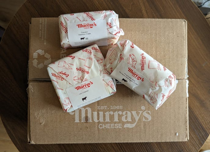 murray's cheese box with three cheeses