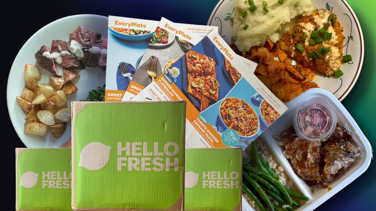 plate of food against a colored wood table surrounded by fresh vegetables