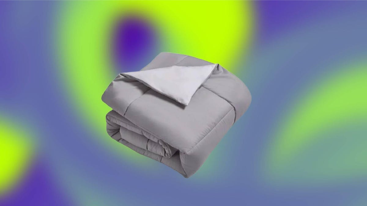 Macy's reversible comforter on a colorful background