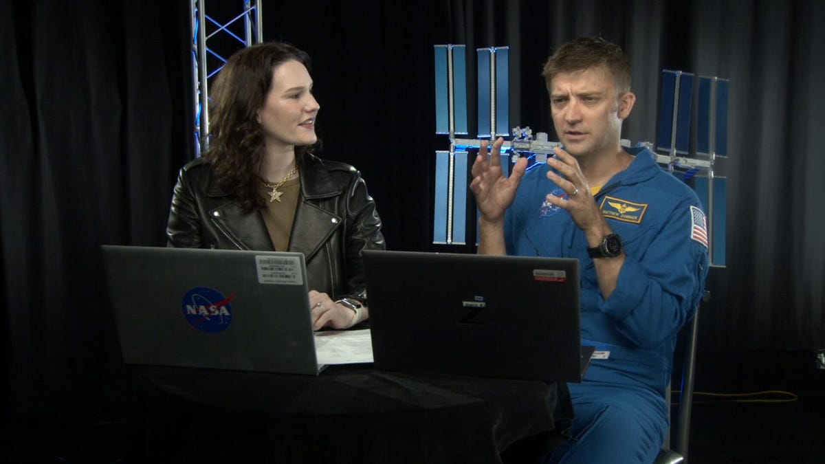 NASA's Leah Cheshier and astronaut Matt Dominick are shown talking on the Twitch stream.