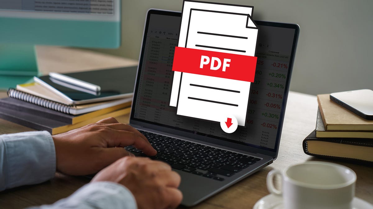 PDF button on screen Laptop computer converting process of document to another format Convert PDF files with online programs.