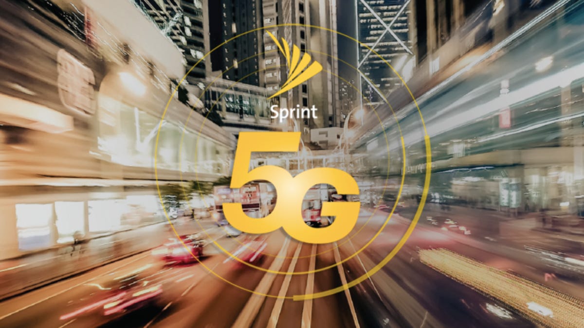 Sprint logo and 5G superimposed on a city street scene blurred to indicate speedy movement.