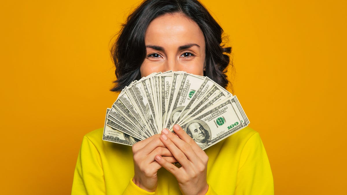 Woman holding cash