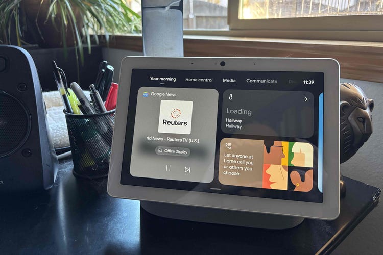 Google's Nest Hub Max showing home cards.