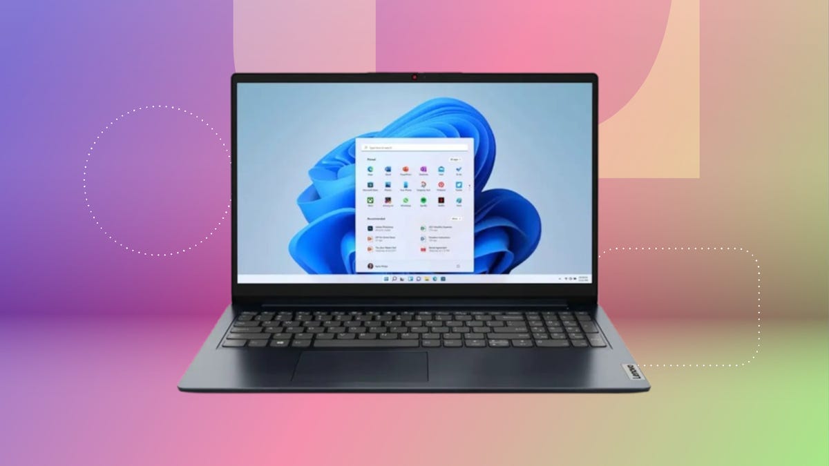 Lenovo IdeaPad 1i on purple CNET background.