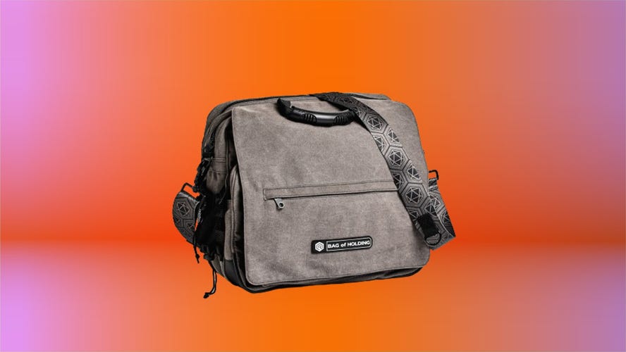 A grey shoulder bag on a red background