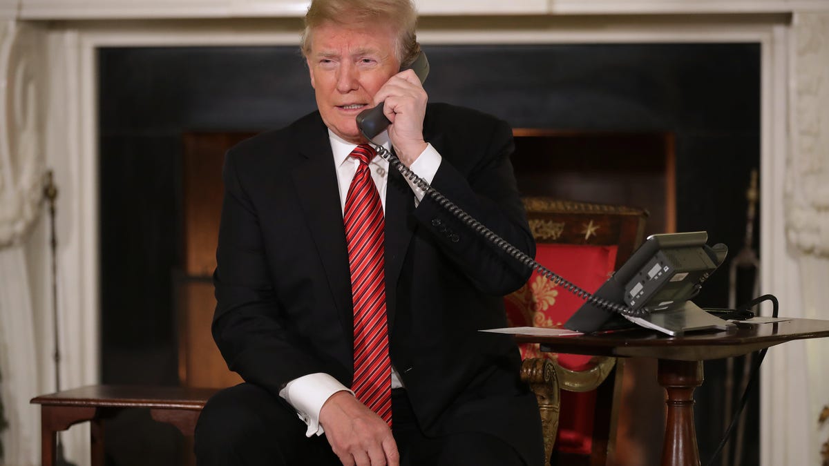 The President And First Lady Assist NORAD With Santa Tracker Phone Calls