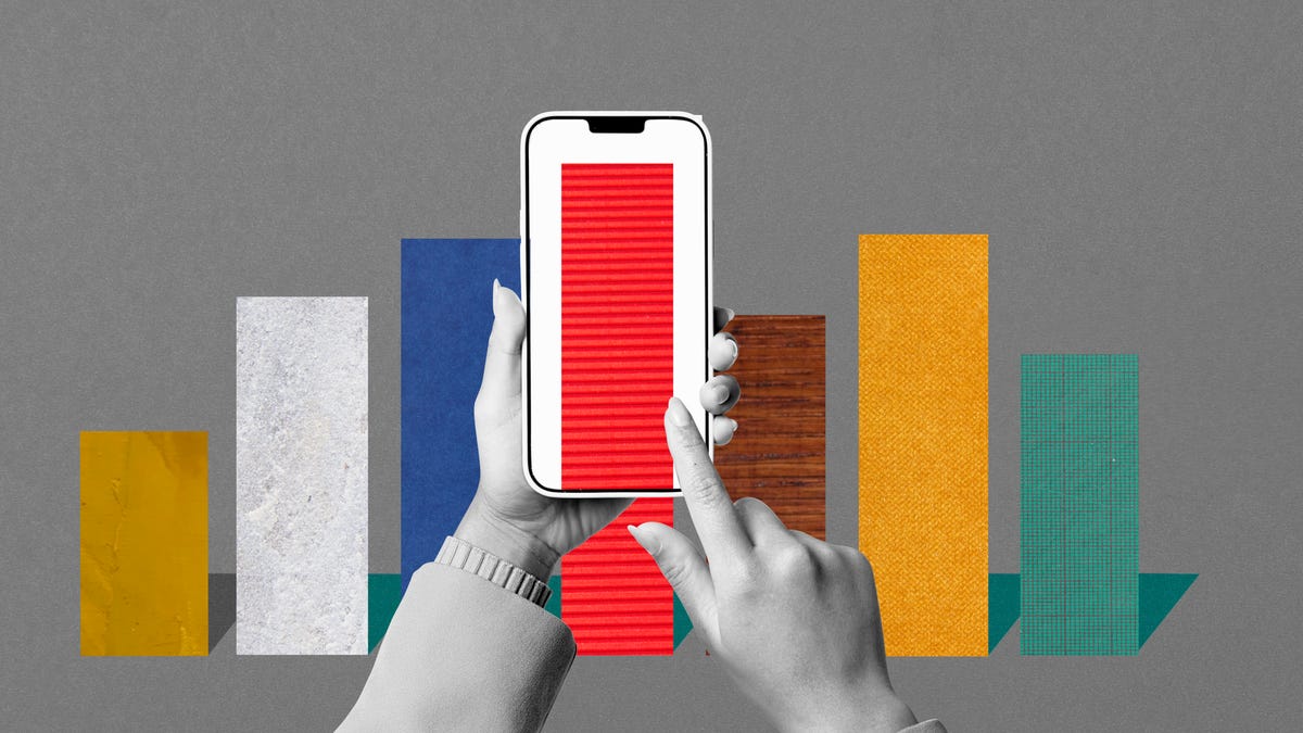 image of smartphone taking a photo of a stock bar graph