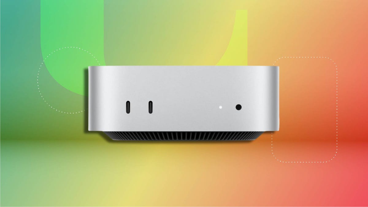 Apple 2024 Mac mini Desktop Computer with sleek silver aluminum casing, front-facing USB-C ports, headphone jack and LED indicator. Set against a vibrant gradient background.