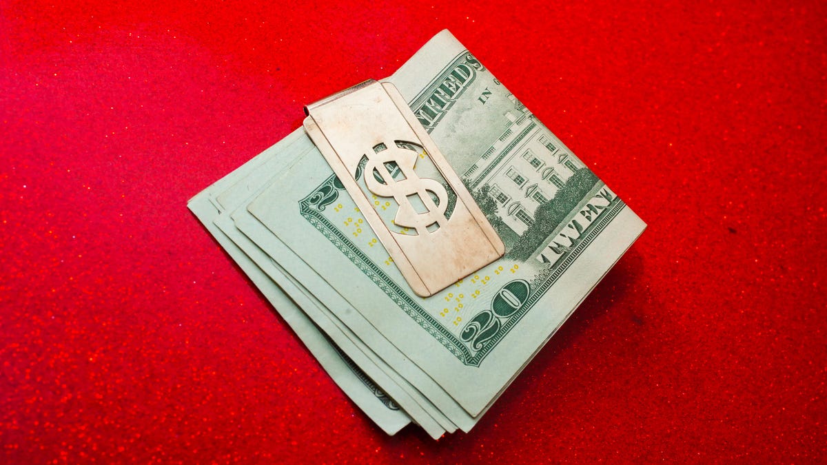 003-stimulus-piggy-bank-tear-falling-money-clip-weighing-cash-scale