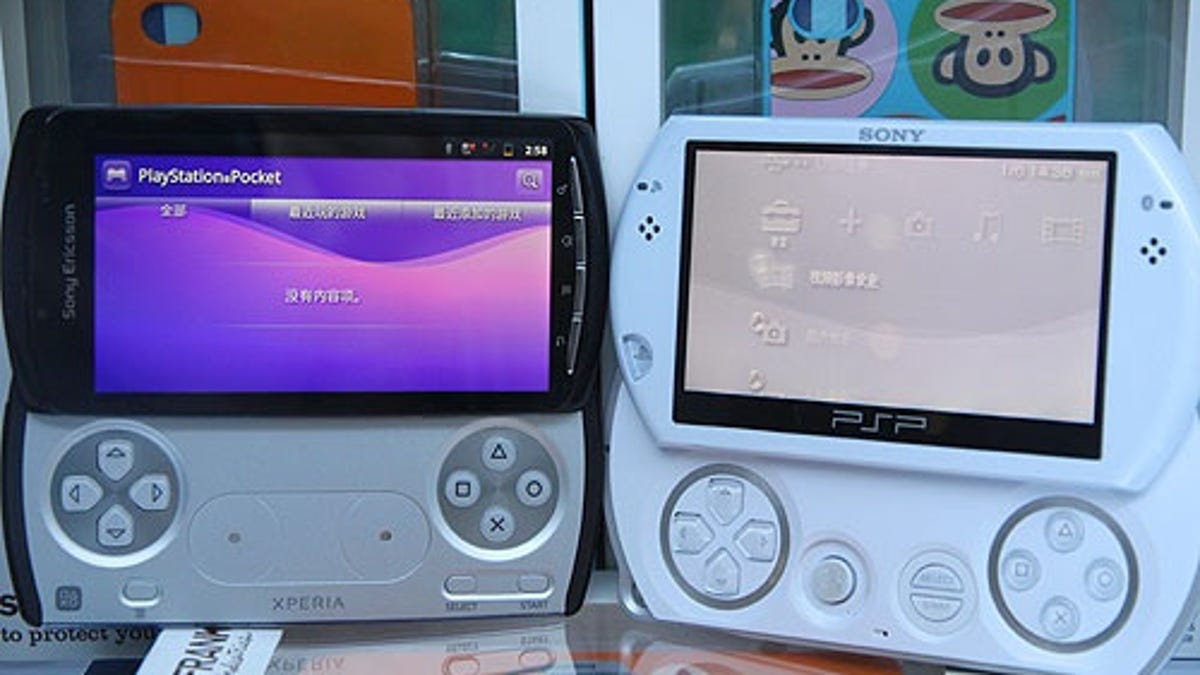 The reported PlayStation phone next to the PSP Go.