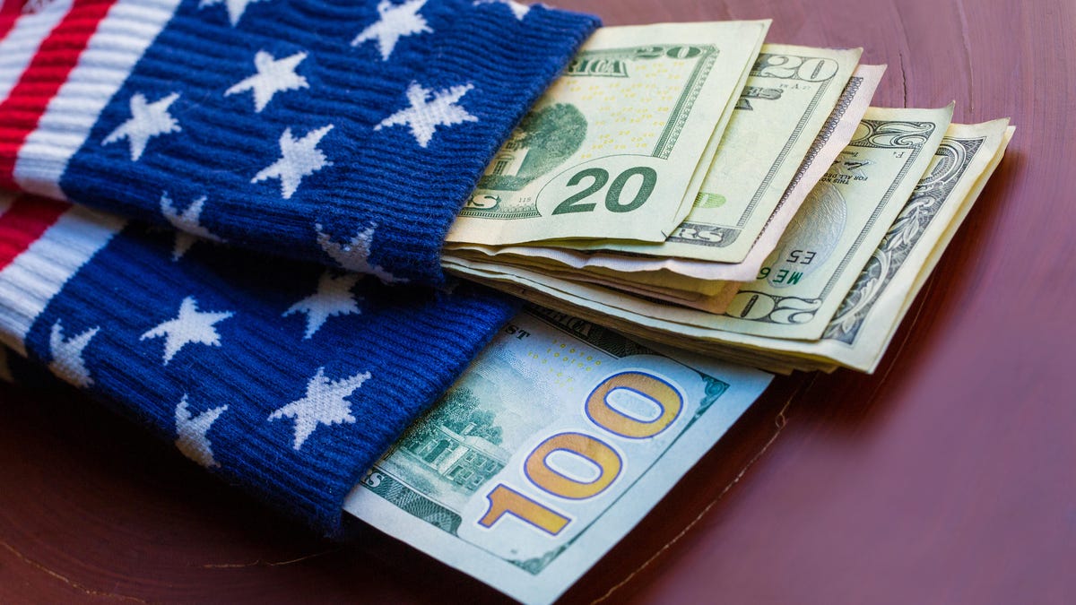 money-dollars-bills-sock-american-flag