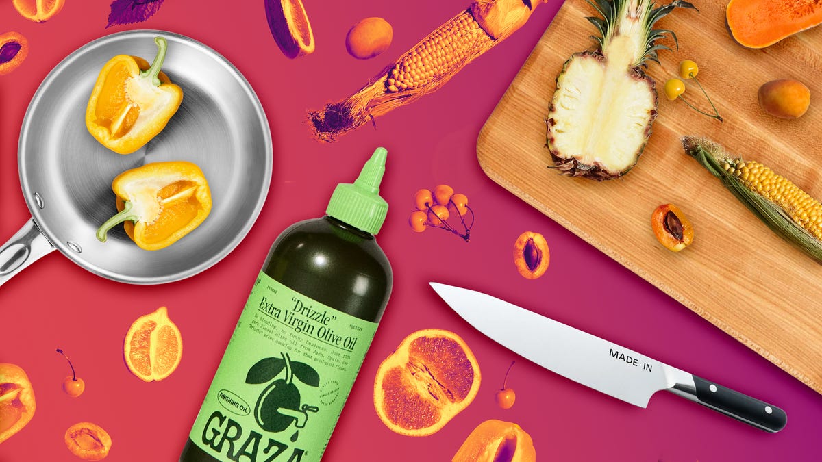 A chef's knife, cutting board, frying pan and cooking oil on a pink background with food