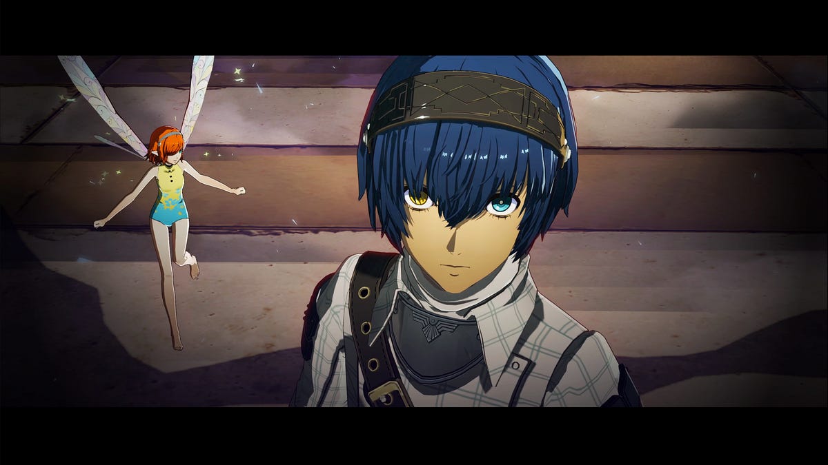 A screenshot of the Metaphor ReFantazio hero and his fairy companion in a cutscene.