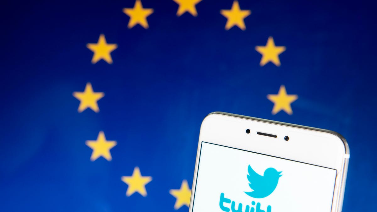 EU flag and Twitter logo
