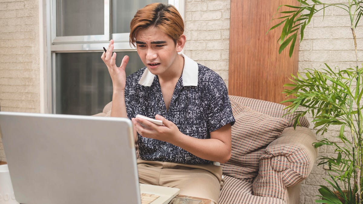 Man frustrated with computer