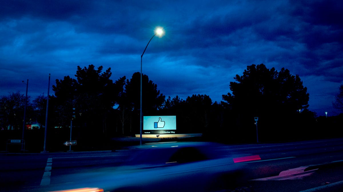 Facebook's headquarters under storm clouds