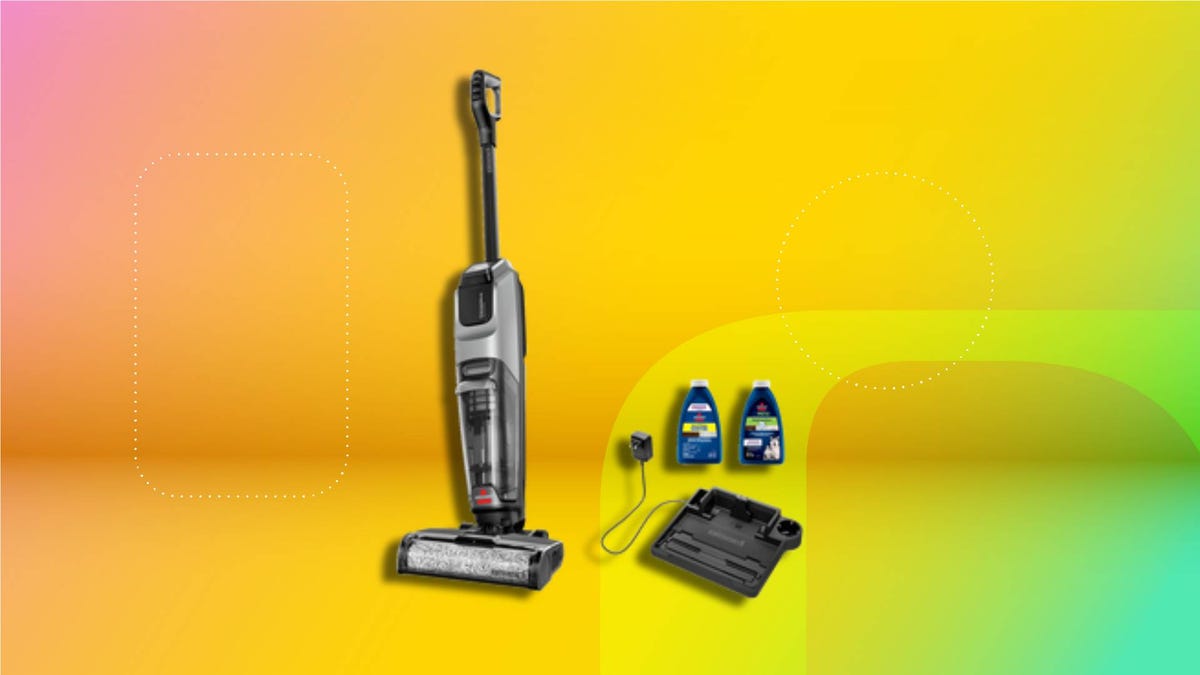 Cordless vacuum mop with dual tanks and a rotating brush for cleaning wet and dry messes on hard floors on CNET background