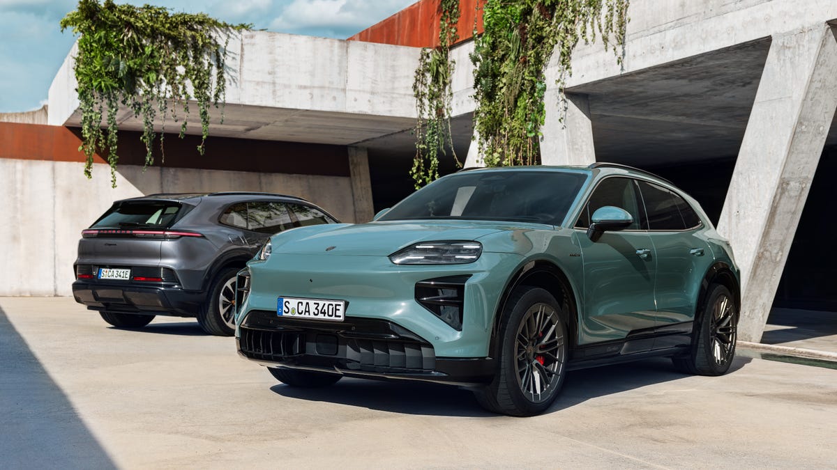 Porsche Electric Cayenne and Turbo Electric Cayene sat on a driveway