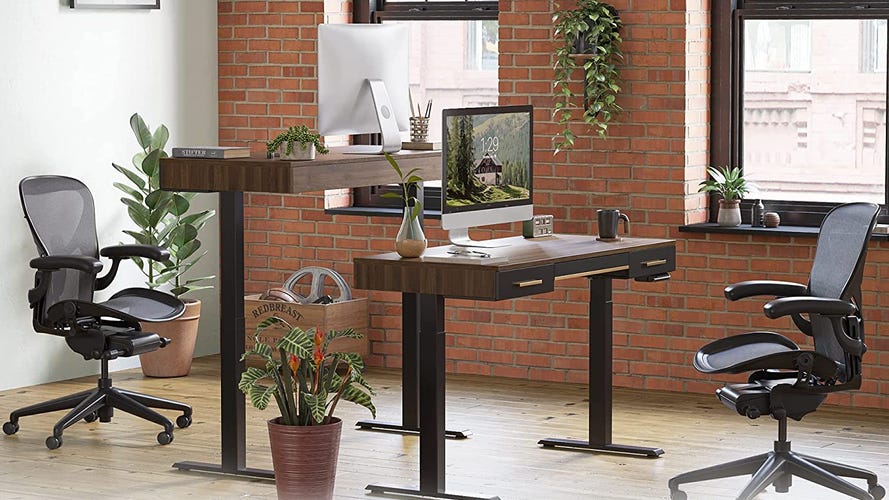 Two dark wood desks back to back