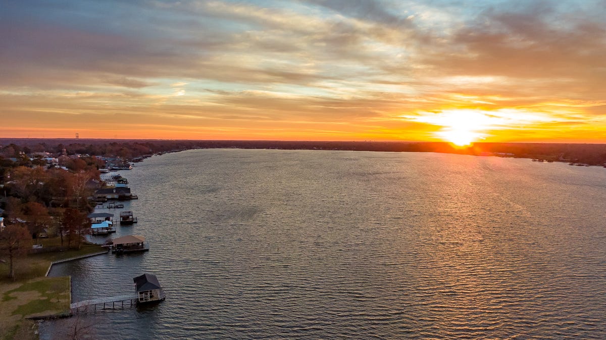 The sun sets over the bayou in Louisiana.