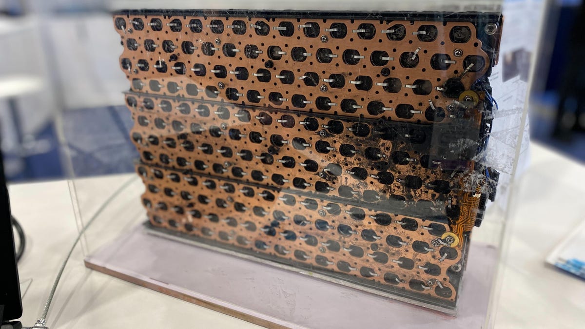 A pack of battery cells with a burned end.