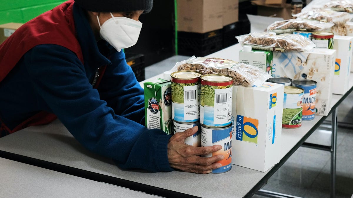 Volunteers prepare food at a food distribution center in the South Bronx, which had one of the highest COVID-19 infection rates in New York City. It's also home to an estimated 60% of New York City's very low income residents.
