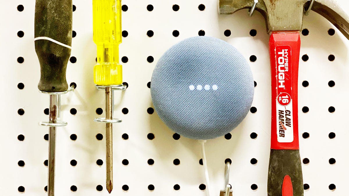 Google Home on pegboard with tools