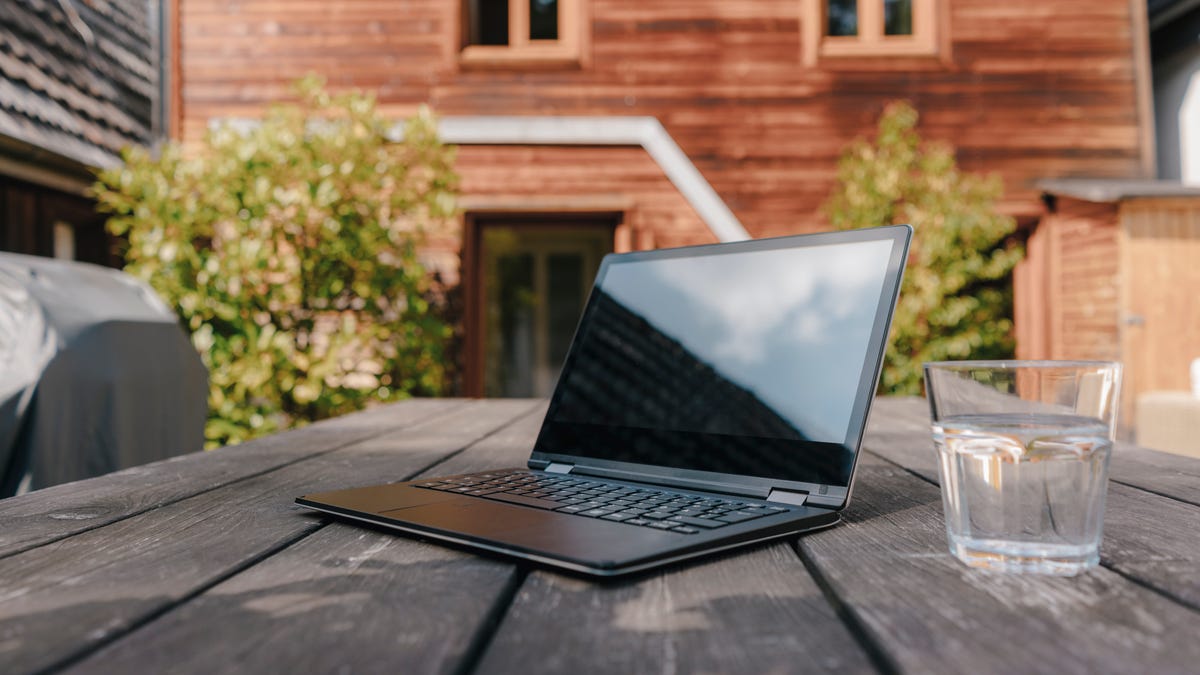 laptop on table outside
