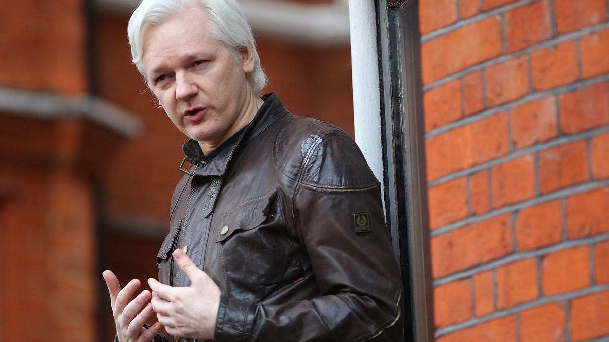 Julian Assange stands on the balcony in front of the Ecuadorian Embassy in London in May 2017.
