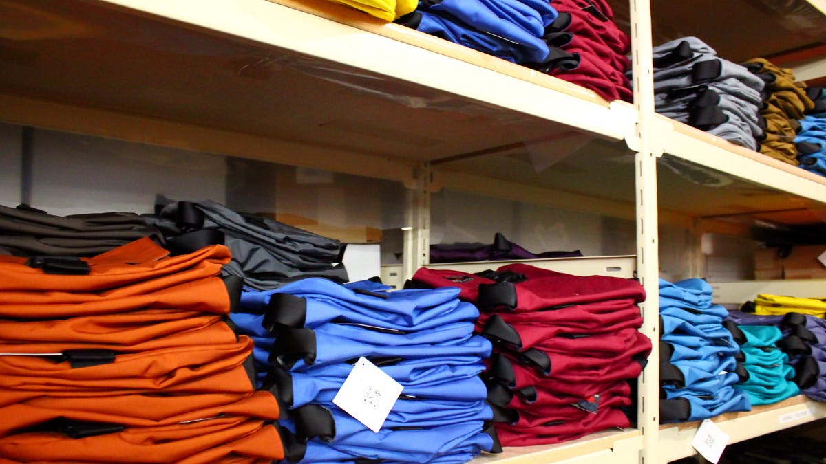 Finished bags on racks at the Tom Bihn production facility