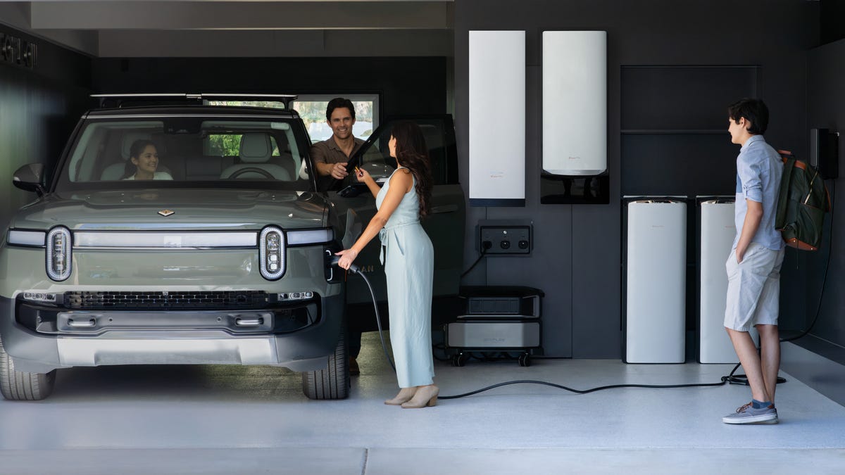 The Ocean Pro battery in a garage charging an EV.