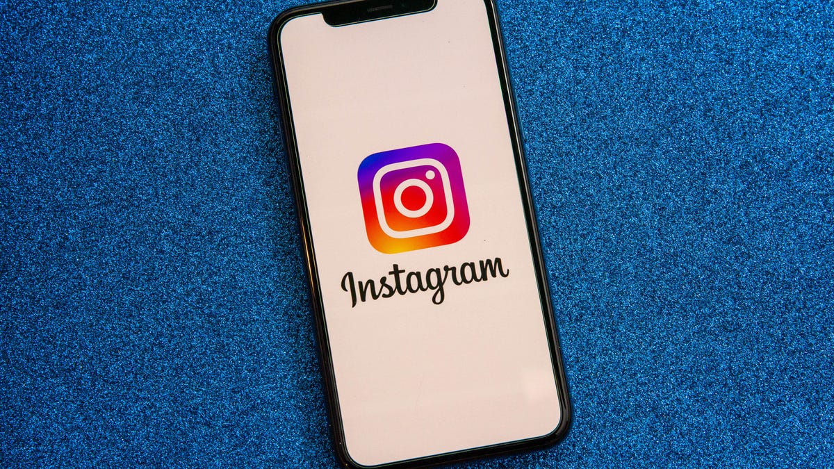 016-instagram-app-logo-on-phone-2021