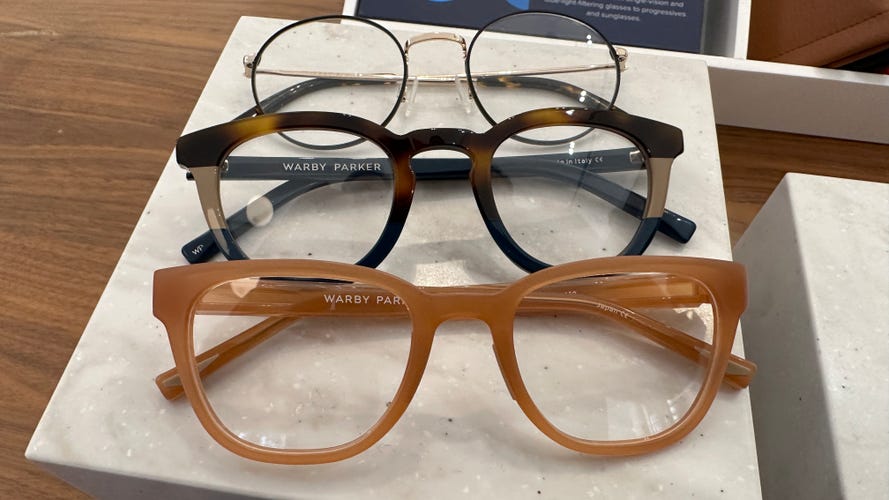 Three pairs of glasses on display