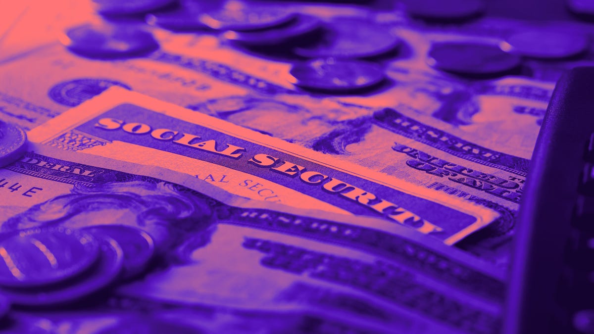 Social Security Card surrounded by dollar bills and coins