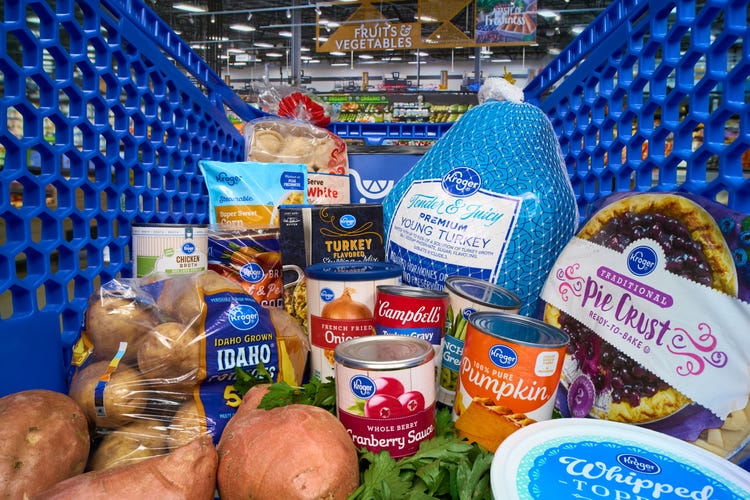 a blue cart with Thanksgiving ingredients