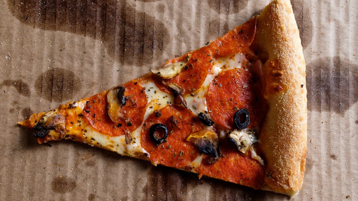 Slice of pizza in a box