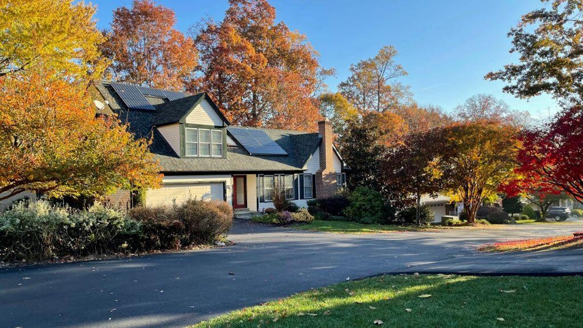 A house with solar panels on it.