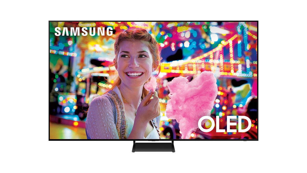 An 83-inch Samsung S90C QD-OLED TV with an image of a smiling woman.