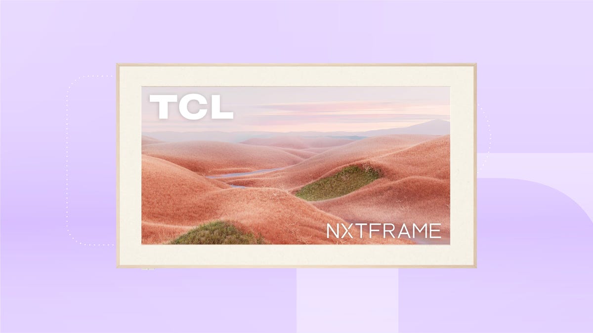A TCL Nxtframe TV with a wooden bezel against a purple gradient background.