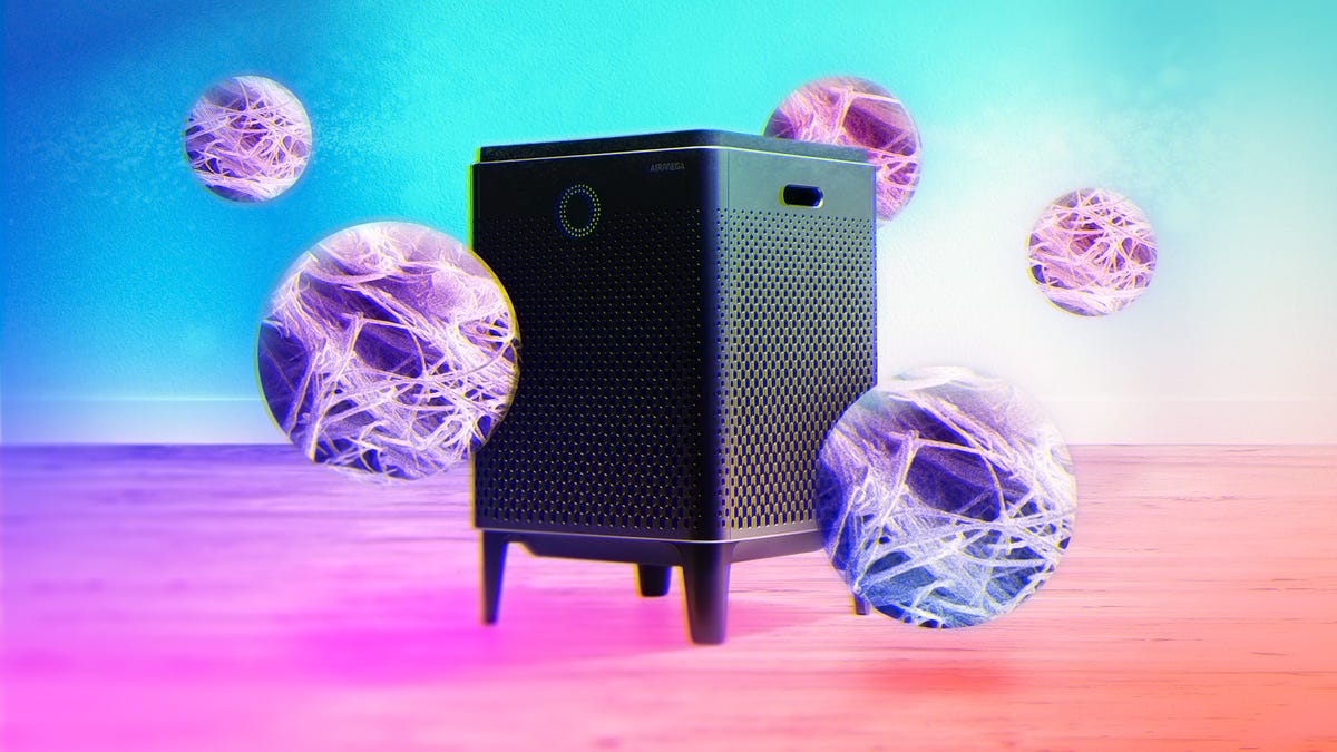 a black air purifier on a gradient background