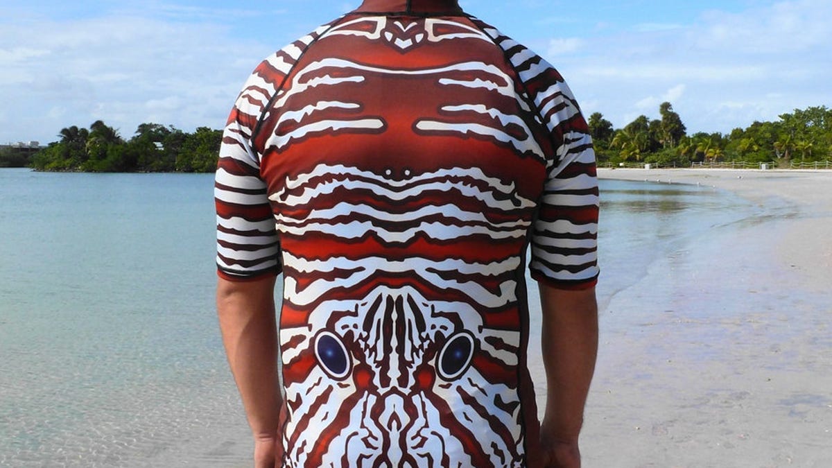 Shark-repellant rash guard