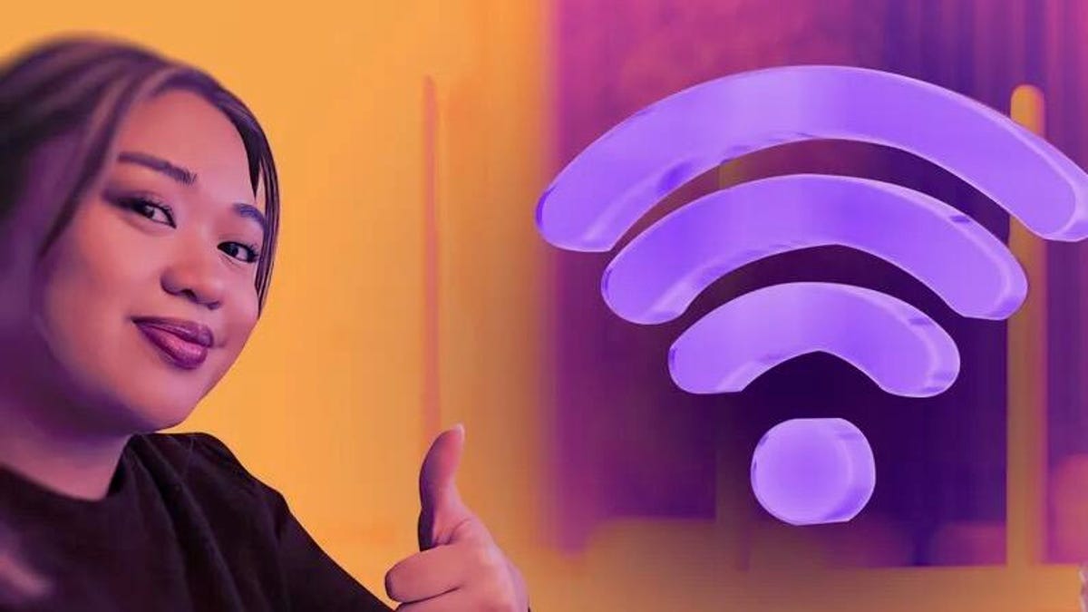 Two routers sit next to each other on a multicolor background