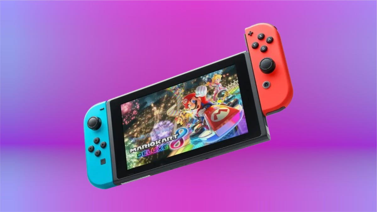 Nintendo Switch with Mario Kart 8 Deluxe on the screen on purple background